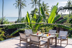 A luxurious room with ocean views at Masmara Resort Canggu, showcasing premium Bali accommodation