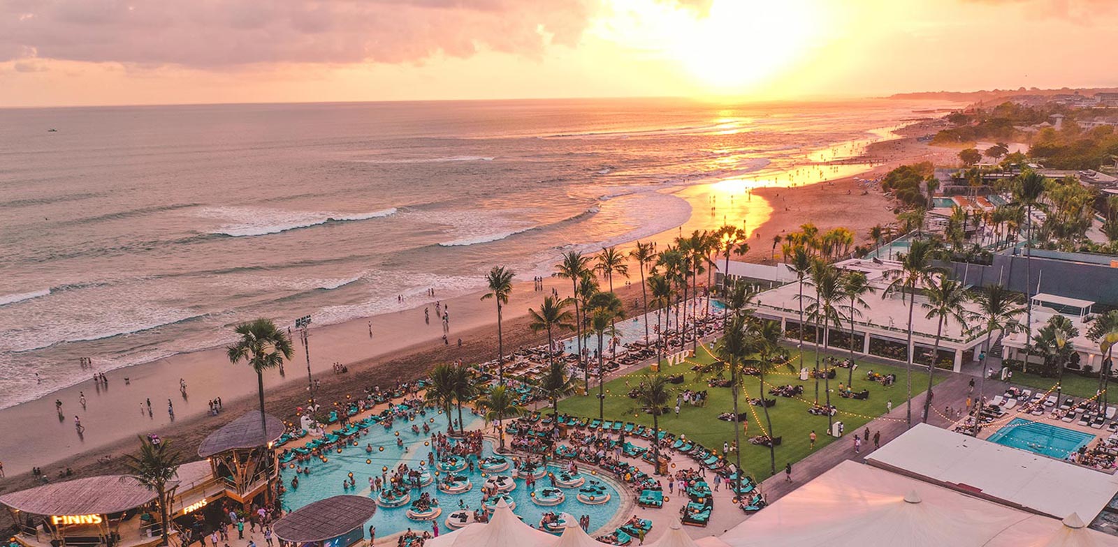 Vibrant nightlife scene in Canggu, highlighting popular spots and the luxurious Masmara Resort Canggu.