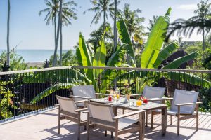 ocean-view resort pererenan bali with modern design and lush surroundings